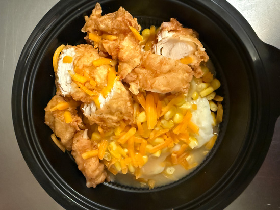 The Keg Bowl featuring chicken strips, mashed potatoes, gravy and corn